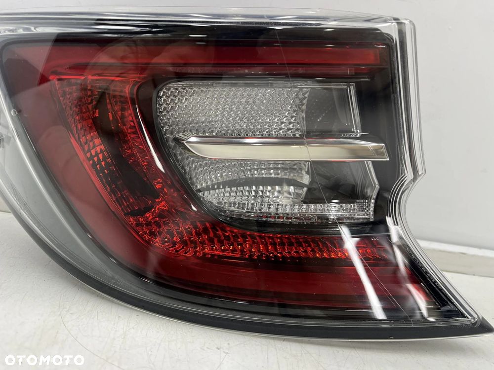 Lampa Toyota Corolla XII E21 18-22r. HB hatchback NOWA lewa tylna LED w błotnik EU Oryginalna lewy t - 5