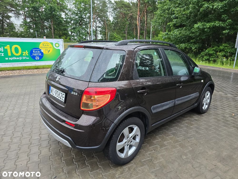 Suzuki SX4 1.6 Comfort Plus - 4