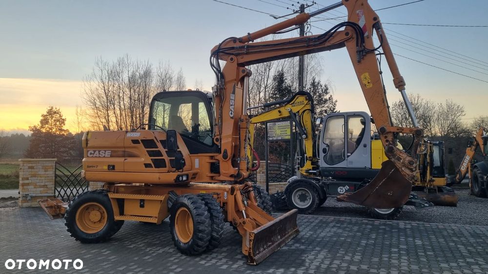 Case WX 125/ Łyżka skarpowa/ Maszyna sprowadzona/ - 1