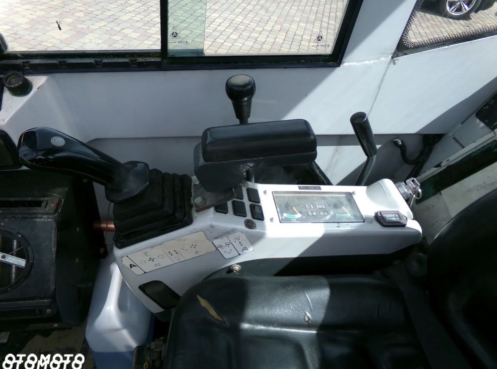 Bobcat x320 minikoparka - 14