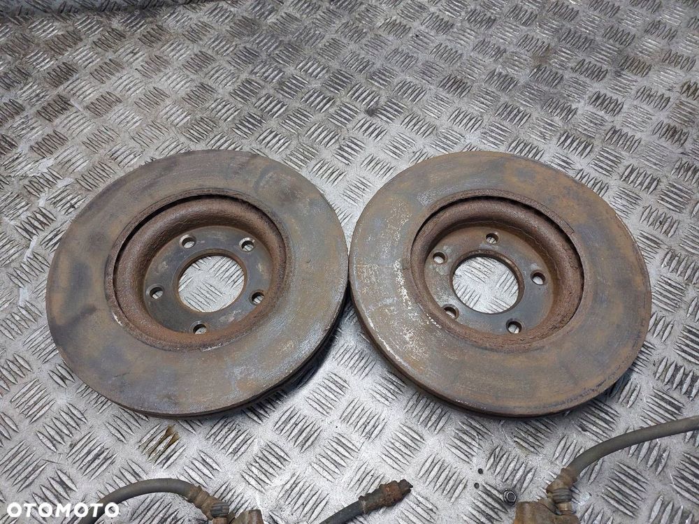 TARCZE HAMULCOWE PRZÓD + KLOCKI + ZACISKI MAZDA 5 I CR 1.8 16V - 3