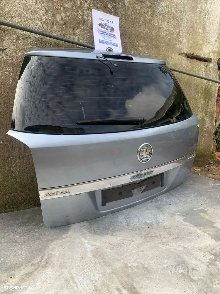 Porta mala Opel Astra H - 2