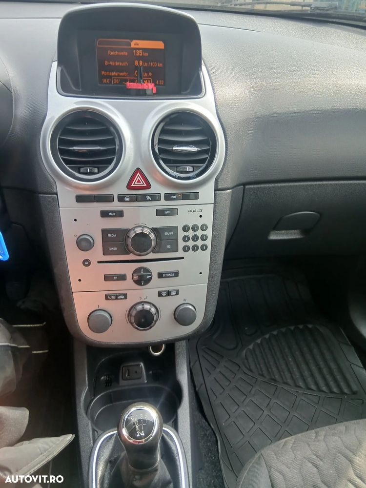 Opel Corsa 1.4 16V Edition - 4
