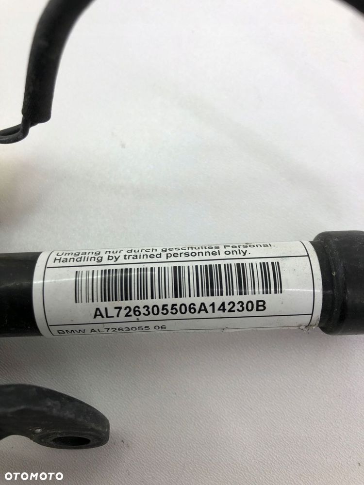 BMW F10 F11 LEWY NABÓJ MASKI 7263055 - 2