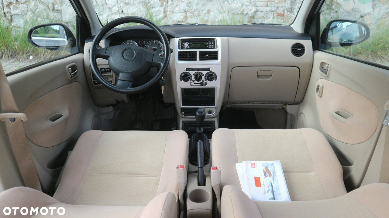 Daihatsu Cuore 1.0 Top - 2
