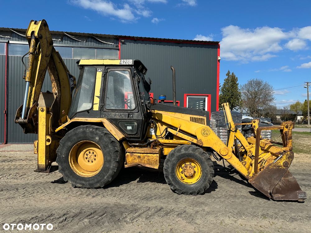 Caterpillar 428B ramię typu Banan - 9