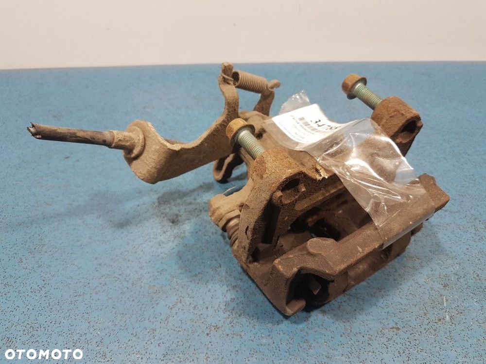 MAZDA CX-5 I 2.0 ZACISK HAMULCOWY TYŁ PRAWY - 1