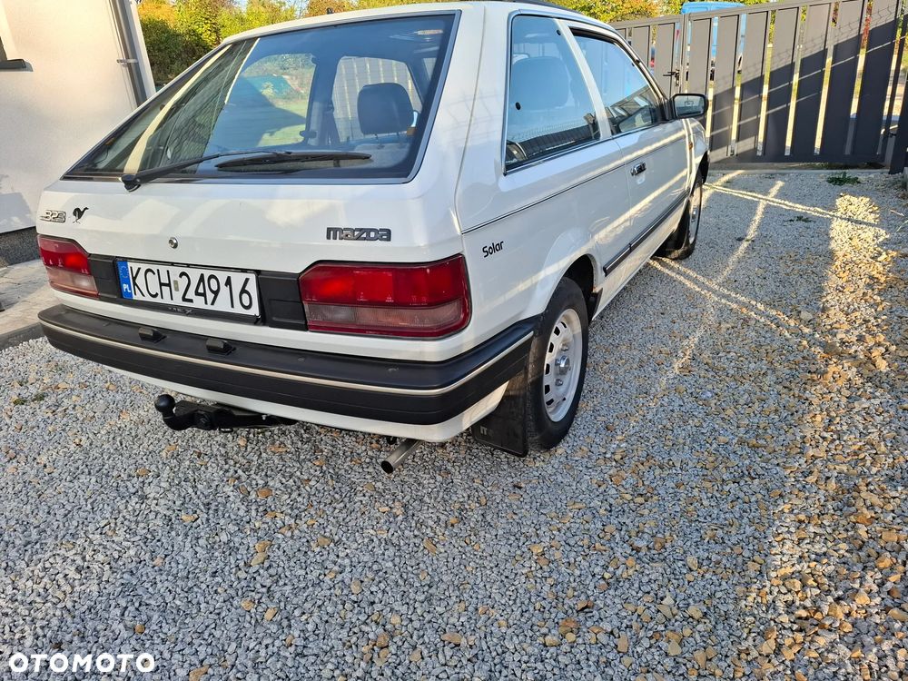 Mazda 323 - 24