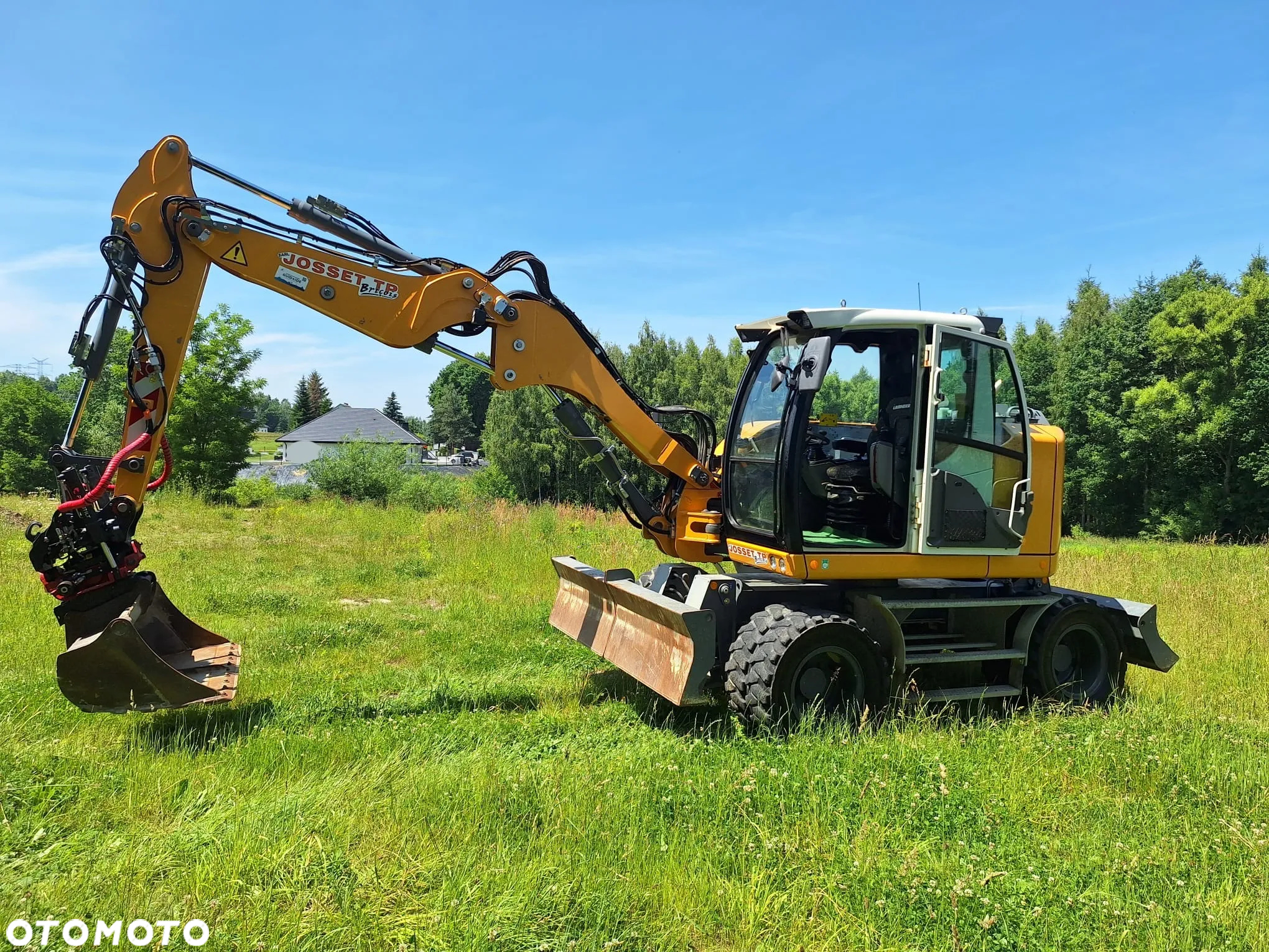 Liebherr A910 - 2