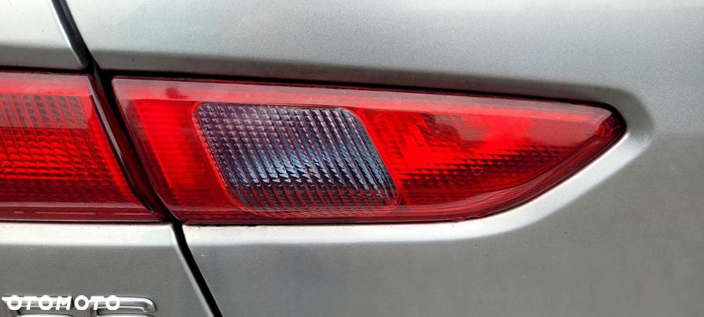 LAMPA TYŁ LEWY W KLAPIE ALFA ROMEO 156 - 1