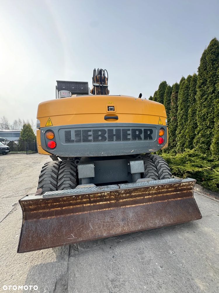 Liebherr 314 Litronic Rotator - 7