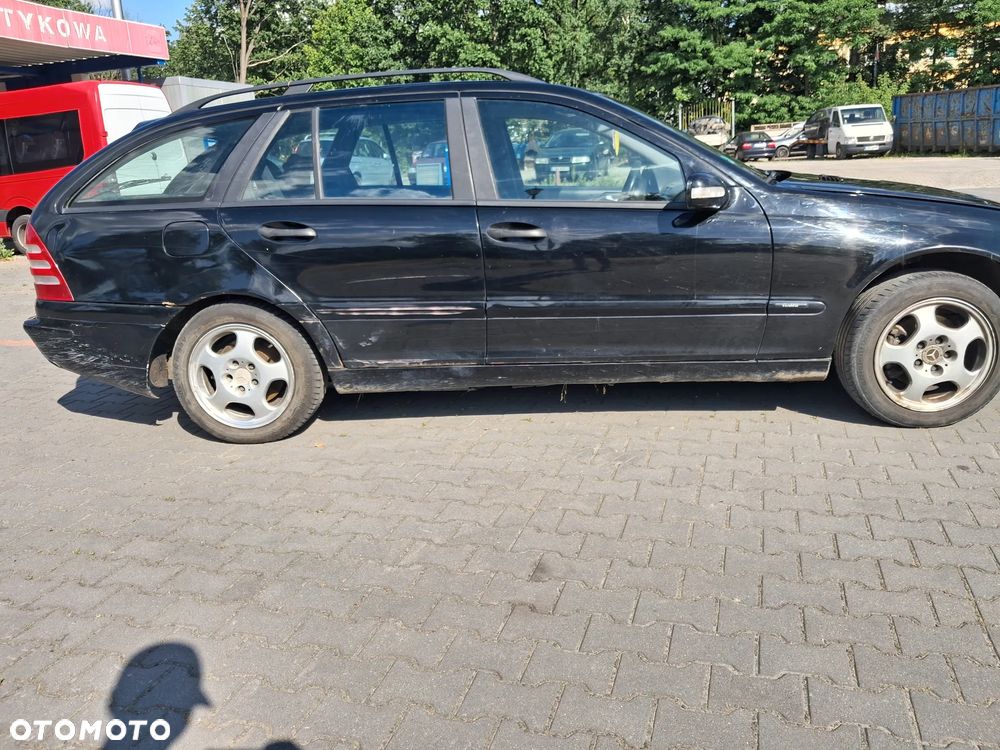 Mercedes C klasa W203 KOMBI silnik kompletny 1.8 Kompresor 143 KM OM271.946 271946 skrzynia biegów 716.628 drzwi maska klapa zderzak błotnik kolor czarny 040 lampa maglownica pompa wspomagania sprężarka dyfer wał napędowy półoś zwrotnica sterownik czujnik moduł wiązka przewód blenda szyba podszybie radio panel sterowania pompa pompka abs paliwa kierownica manetka włącznik fotel schowek zegary głośnik alternator rozrusznik cewka zbiorniczek sprężarka klimatyzacji klamka zamek zacisk hamulcowy mechanizm chłodnica pas przedni boczek lusterko silniczek sanki belka zawrotnica mcperson NA CZĘŚCI - 5