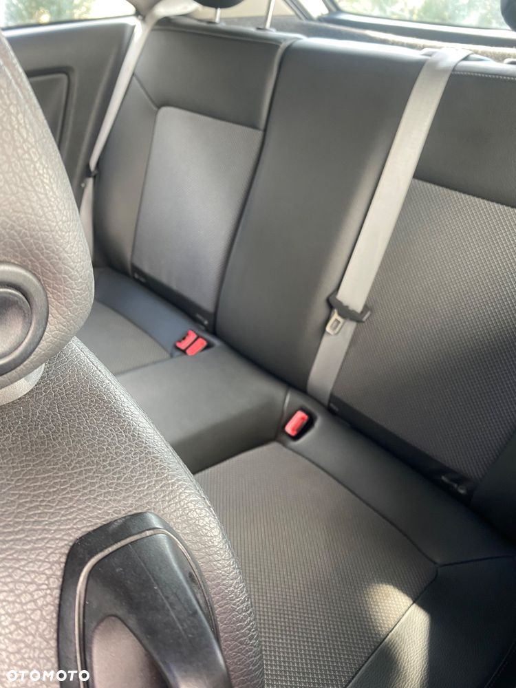 Opel Corsa 1.4 16V Cosmo - 11