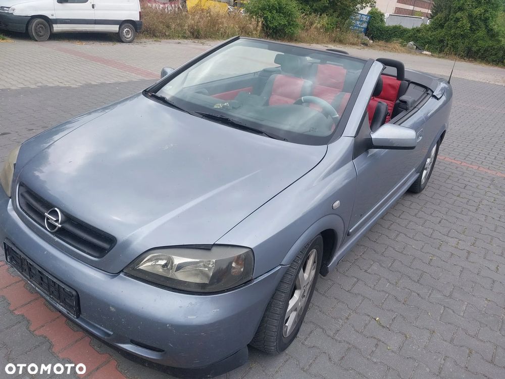 Opel Astra G Bertone Cabrio Cabriolet silnik 1.6 16v 103 KM skrzynia biegów F17 drzwi maska zderzak błotnik lusterko klapa Z4AU Z163 dach dachu składanego maglownica szyba podnośnik fotel kanapa zegary zestaw startowy czujnik felga maglownica zwrotnica sterownik panel moduł listwa wydech tłumik belka sanki zacisk jarzmo tarcza NA CZĘŚCI WSZYSTKIE CZĘŚCI - 7