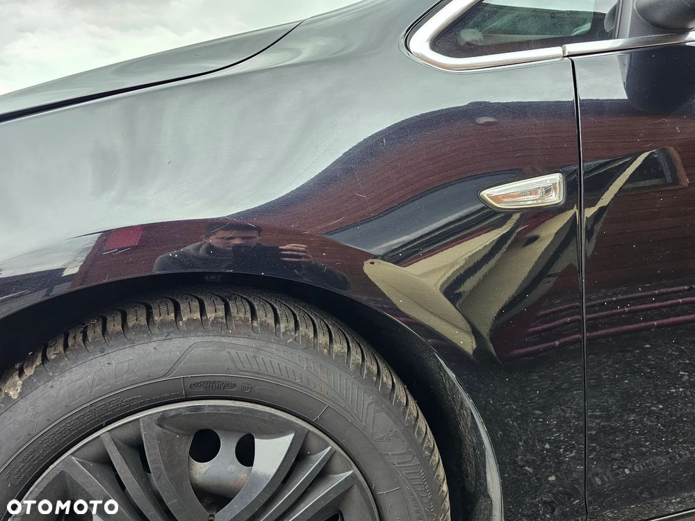 BŁOTNIK LEWY PRZÓD PRZEDNI OPEL ASTRA J Z20R - 9