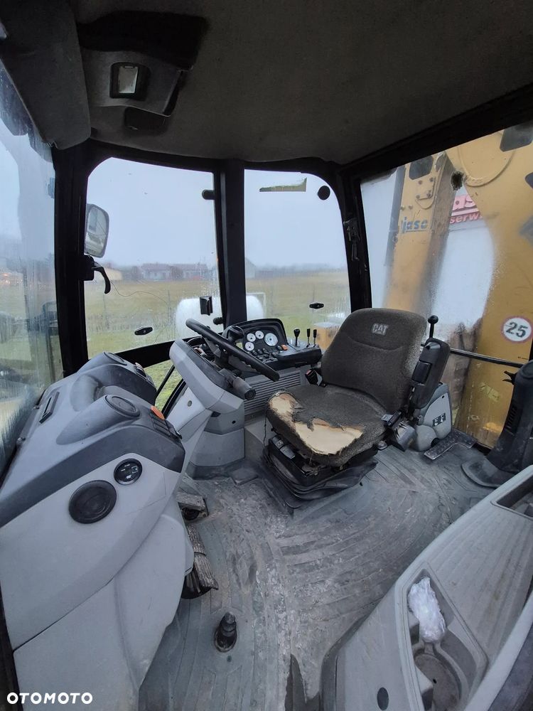 Caterpillar 428E - 6