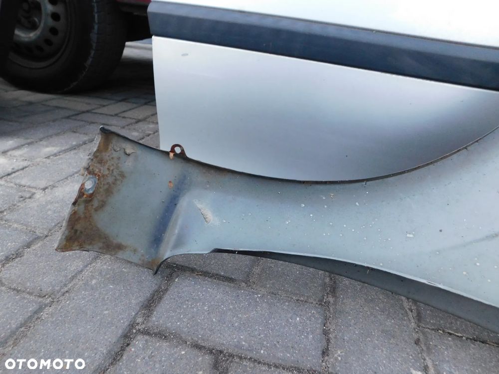 błotnik prawy przód OPEL ZAFIRA B - 12