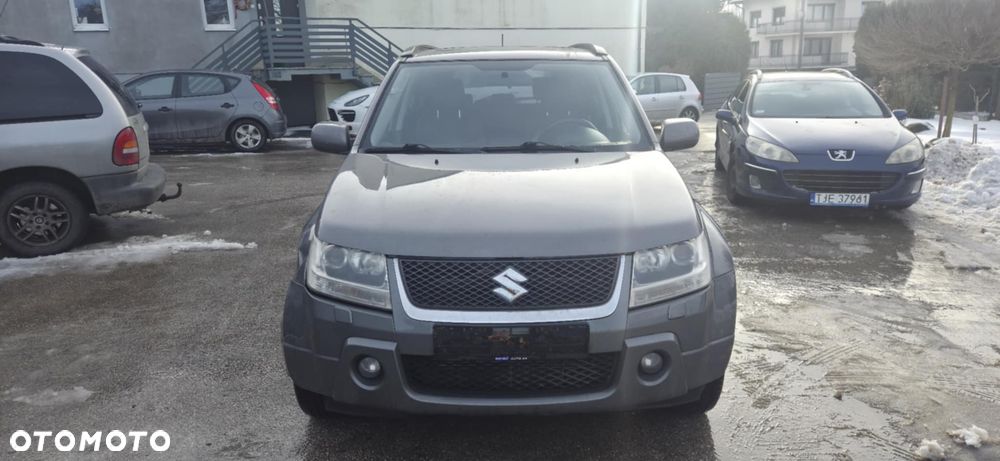 Suzuki GRAND VITARA II ZDL pas przedni ciety - 1