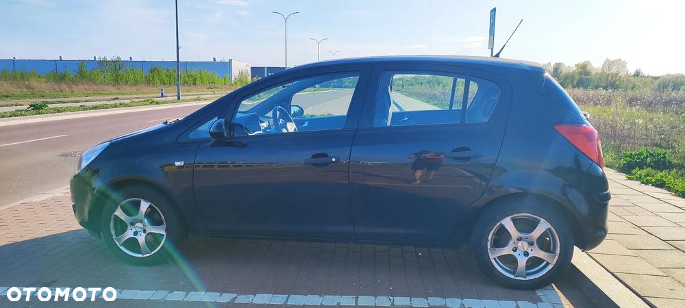 Opel Corsa 1.2 16V Cosmo - 19