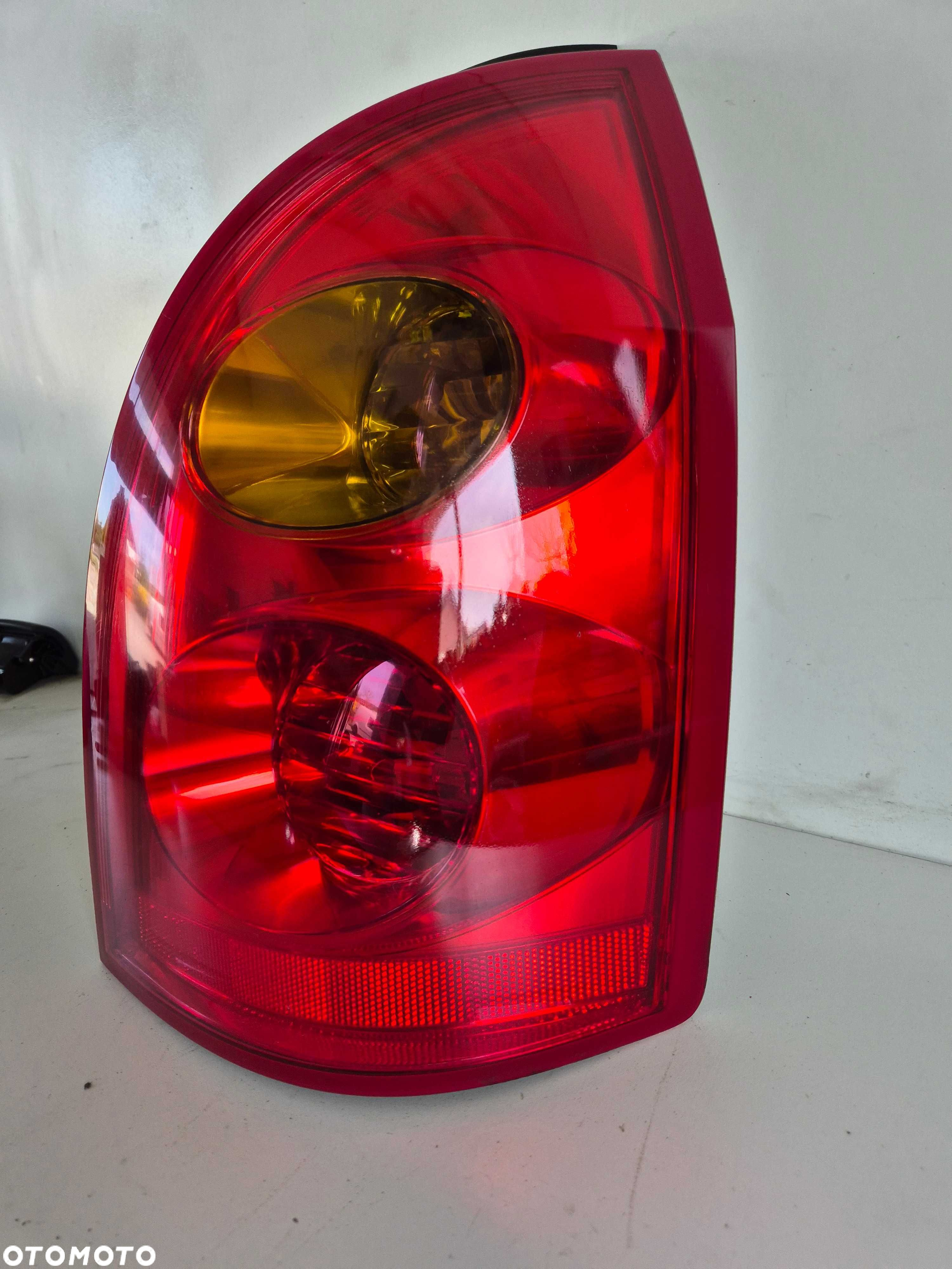 nissan primera p12 kombi lampa tylna prawa prawy tył oryginał europa - 5