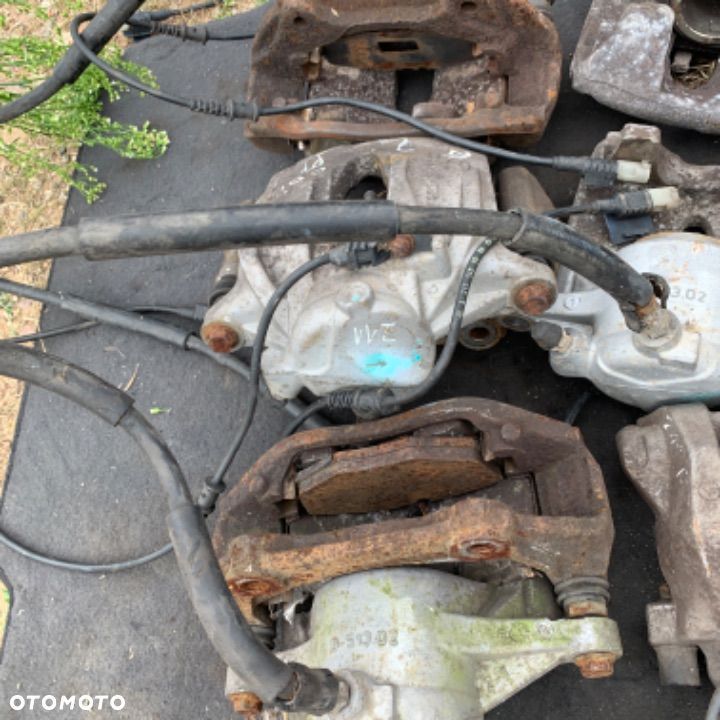 mercedes e 211 cls 219 zacisk tył zaciski przód - 9