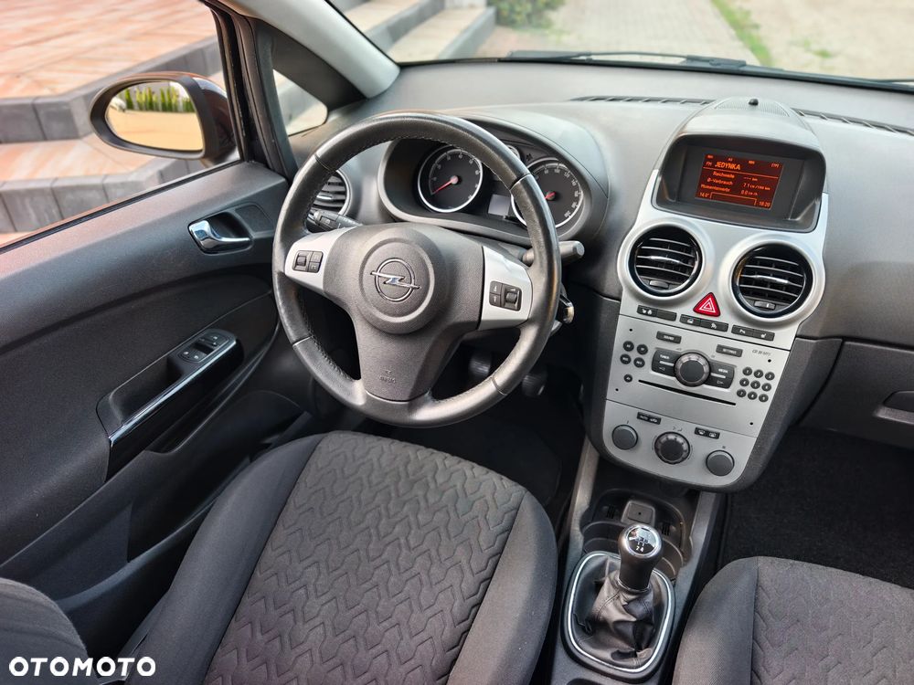 Opel Corsa 1.4 16V Active - 11