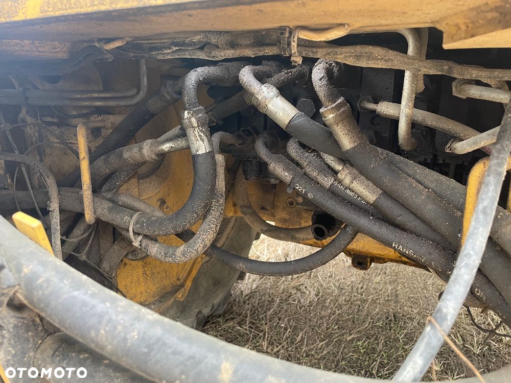 Caterpillar 428E - 12