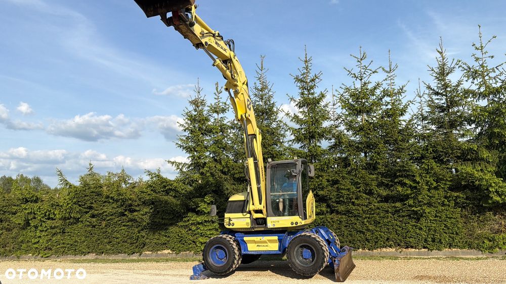 Mecalac Koparka 14 ton MECALAC 15 MWR koparko-ładowarka 3 łyżki widły 1 wł Centr.smarowanie Opony na BLIŹNIAKU 80%Camso ładowarka 714 12MTX 4x4 skrętne KLIMA kabina Premium silnik 146KM volvo EW140B DEUTZ szybka 35km/h - 26