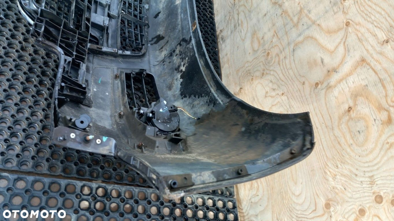 AUDI A6 C6  ZDERZAK PRZÓD  HALOGEN - 10