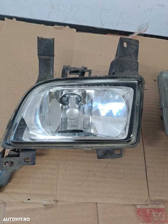 Proiector stanga dreapta Mazda 323 - 6