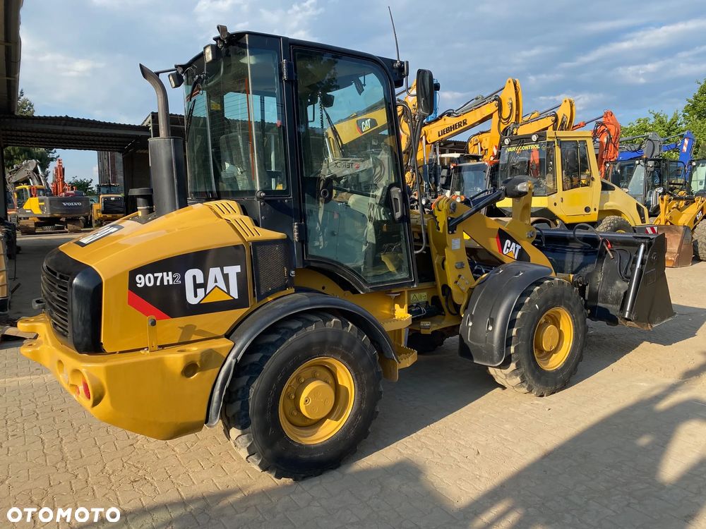 Caterpillar CAT 907H2, 5800 MTH, ŁYŻKA OTWIERANA + WIDŁY, z NIEMIEC, - 8