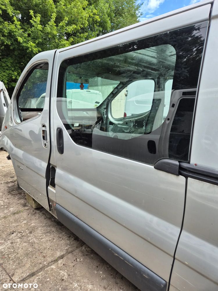 DRZWI LEWE SUWANE BOCZNE TRAFIC VIVARO PRIMASTAR  01-14r. CMG64