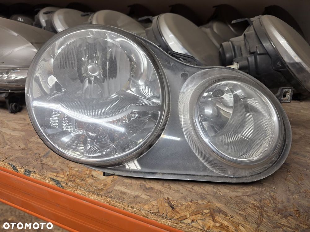 VOLKSWAGEN  POLO 9N OKULAR LAMPA PRZEDNIA PRAWA ANGLIK - 1