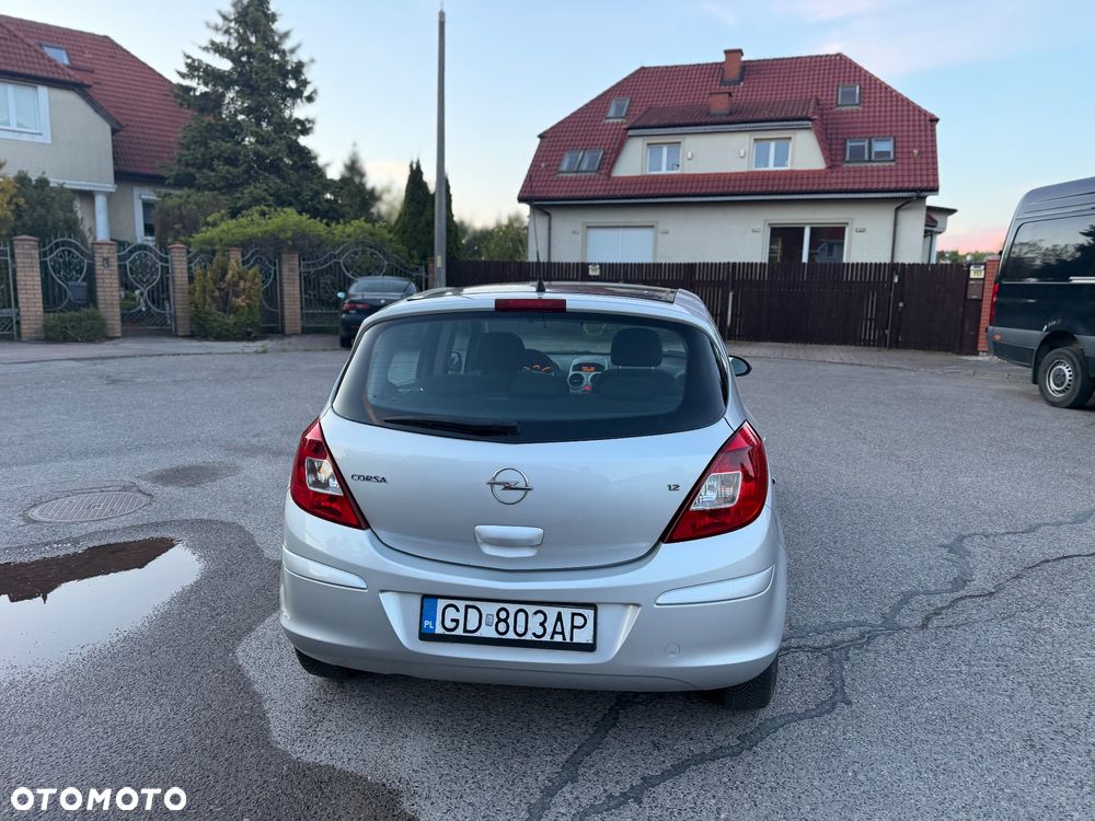 Opel Corsa 1.2 16V Cosmo - 7