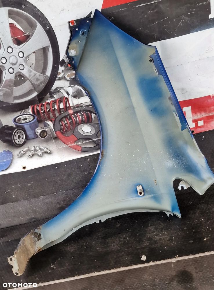 BŁOTNIK PRAWY PRZÓD OPEL CORSA D Z21B - 11