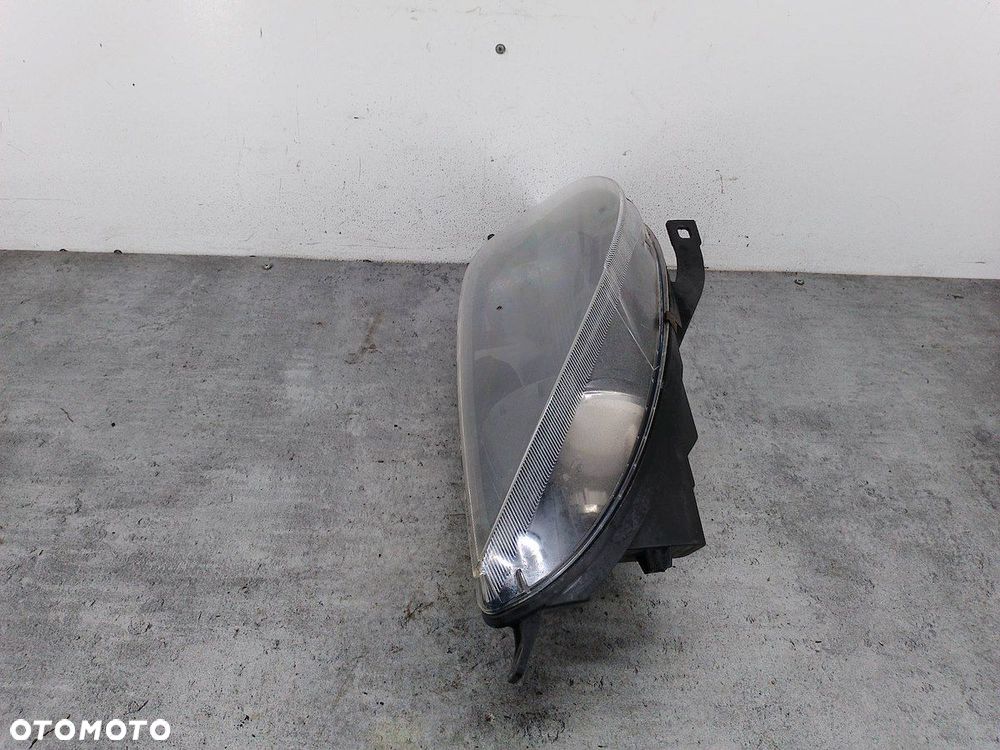 LAMPA PRZÓD PRAWA MITSUBISHI COLT VI 8301A994 0301208222 - 9