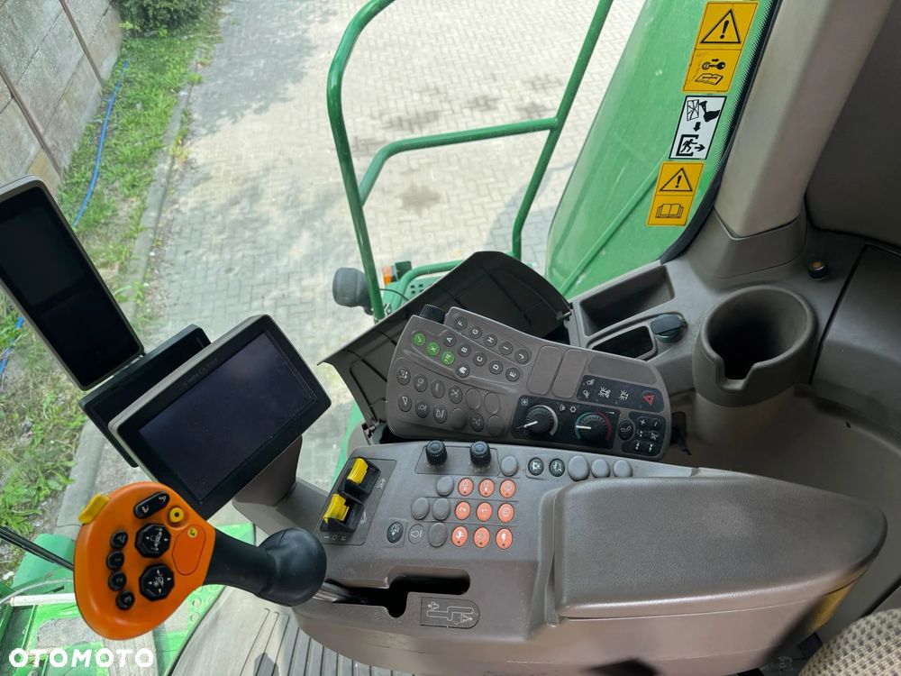 John Deere T670 - 17