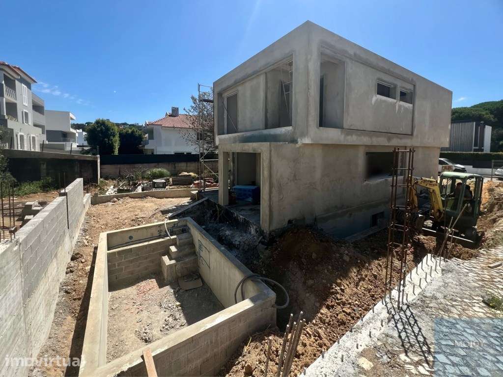 Moradia Isolada T4+1 de Arquitetura Contemporânea com Piscina no Es... - Grande imagem: 2/24