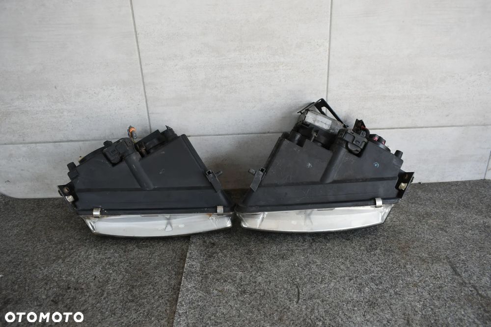 LAMPA LAMPY PRZÓD PASSAT B5 XENON HELLA - 11