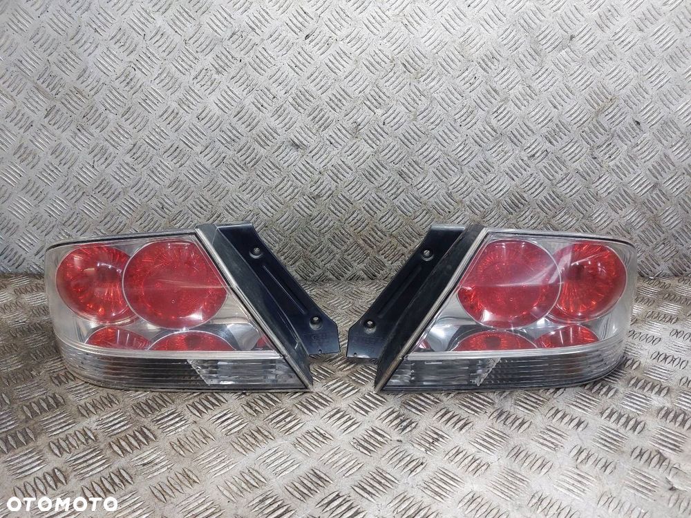 LAMPA LEWY TYŁ + PRAWY TYŁ MITSUBISHI LANCER VII SEDAN - 1