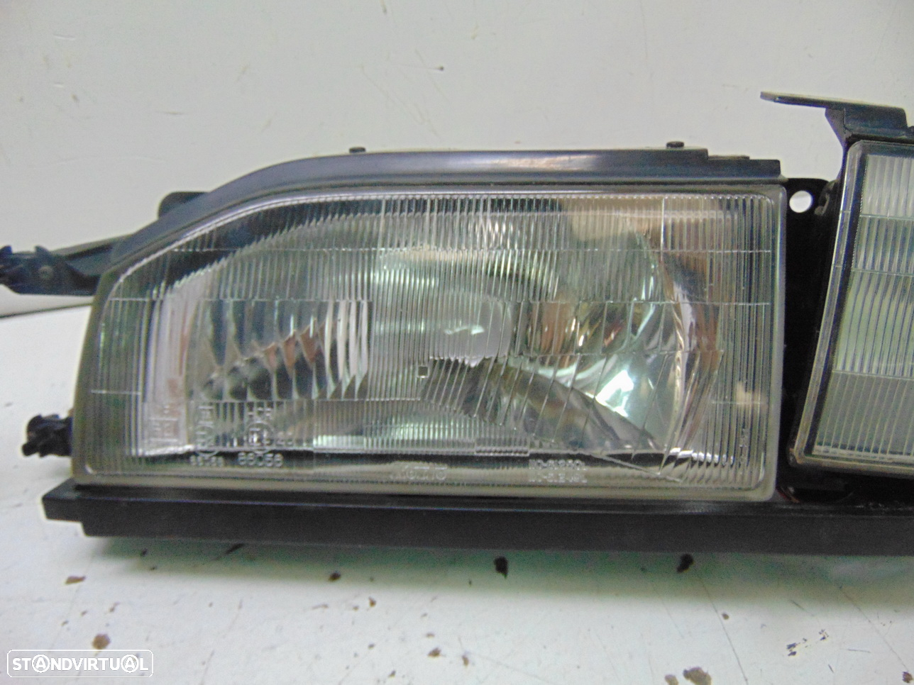 Mazda 323 faróis frente - 5