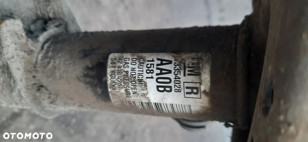 SERWO HAMULCA  - OPEL ASTRA J - 13338058 Astra j 1.4 turbo MacPherson 13354024 13354028 Amortyzator zwrotnica piasta  Kompletna noga - 15