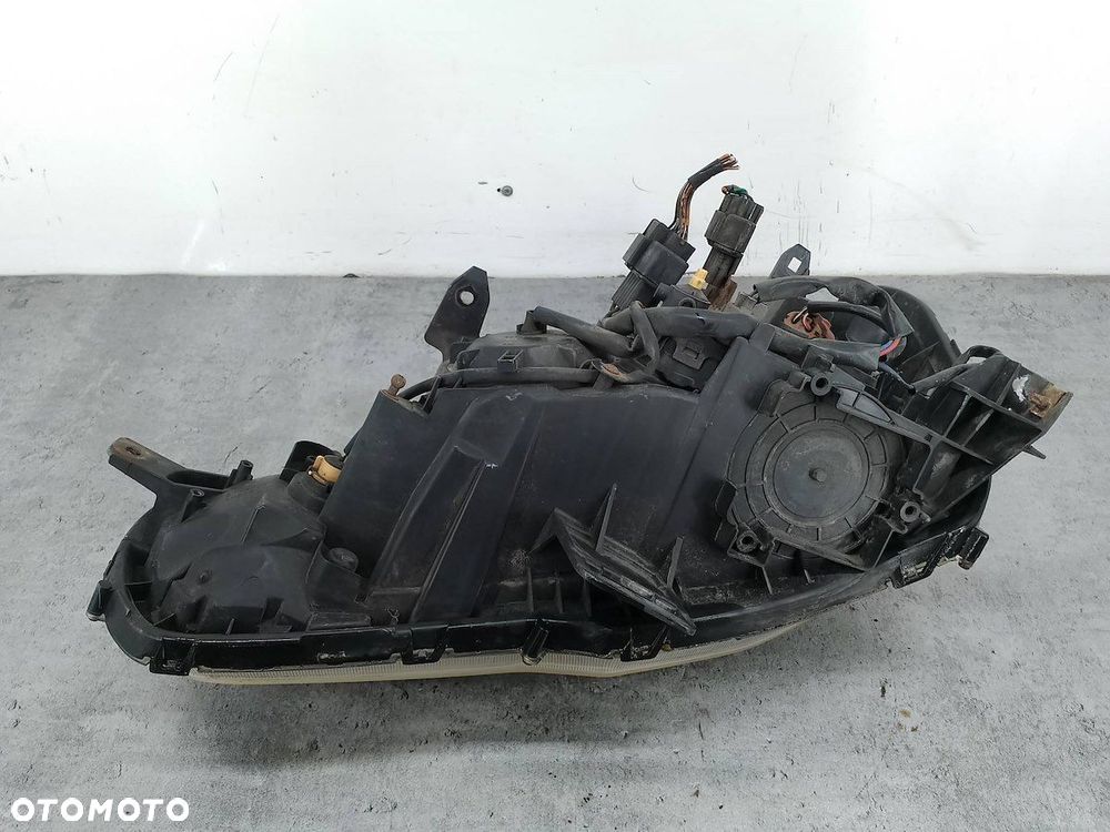 LAMPA PRZÓD PRAWA MITSUBISHI LANCER IX P6117 P6118 - 2