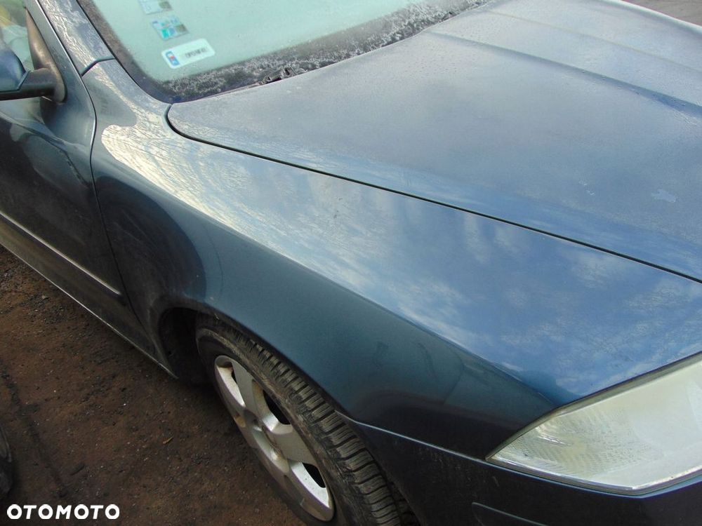 BŁOTNIK PRAWY PRZÓD SKODA OCTAVIA II U9U9 - 1