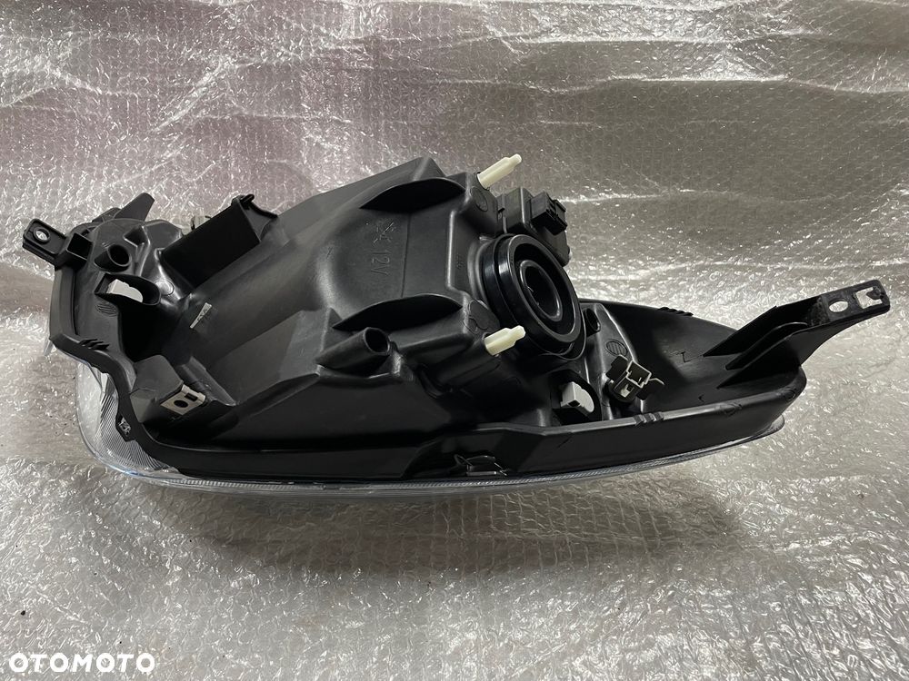 LAMPA PRAWA ZWYKŁA NISSAN NOTE E11 260109U10A - 7