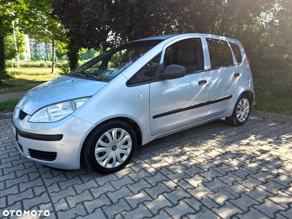 Mitsubishi Colt 1.1 Invite Edition Gold - 1