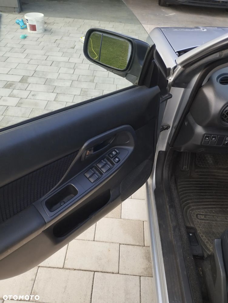 Subaru Impreza 1.6 TS - 9