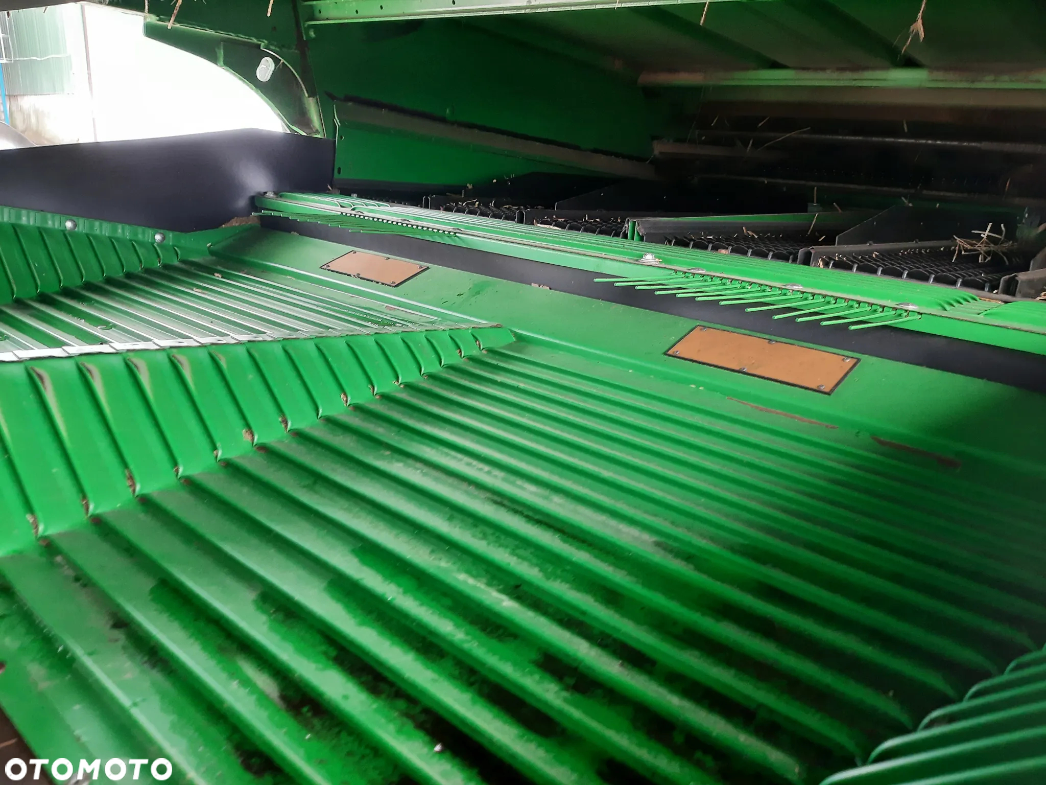 John Deere T670 - 14