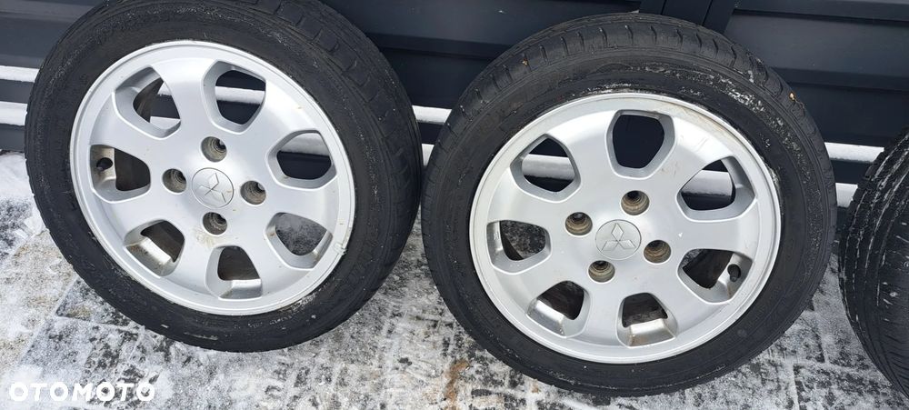 ALUFELGI  4SZT MITSUBISHI R15/4x114.3/DOT 46/15X6JH2/OTW.CEN 56.1 - 3