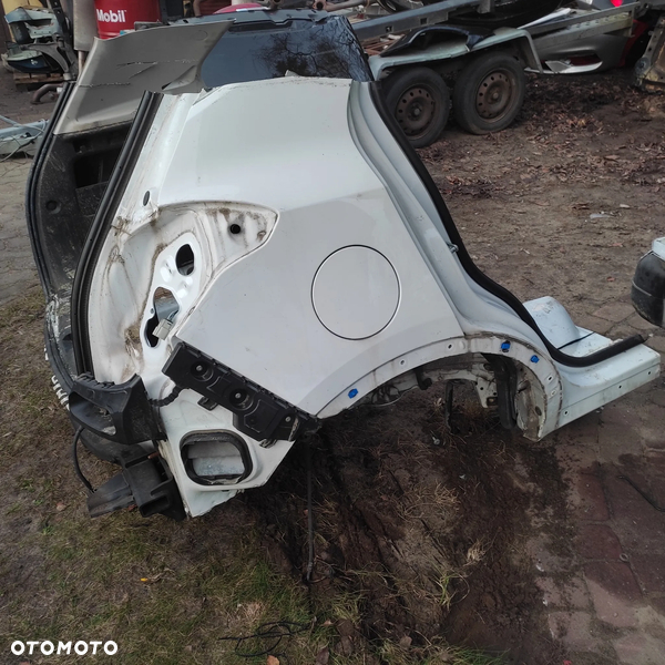 Tył tył błotnik prawy lub lewy Opel Mokka kolor Z40R